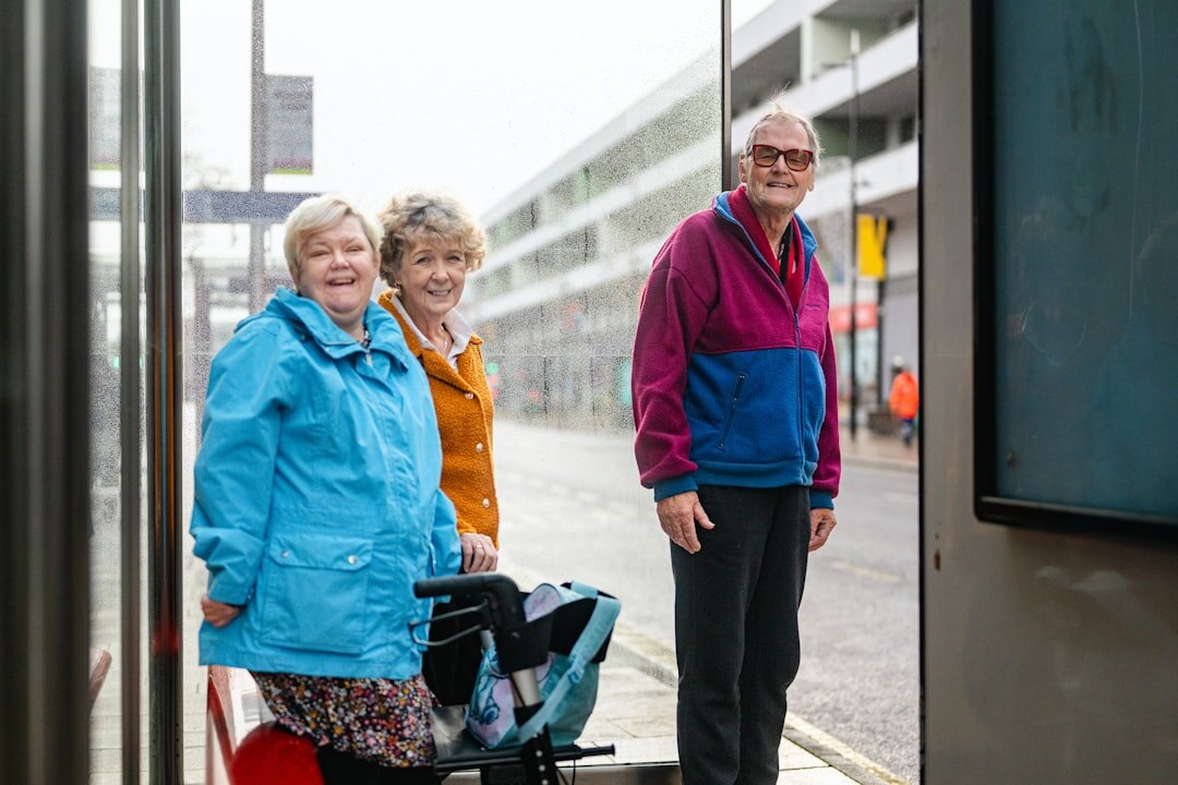 Diverse group of active seniors smiling together outdoors